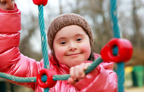 Photo of child playing on the playground