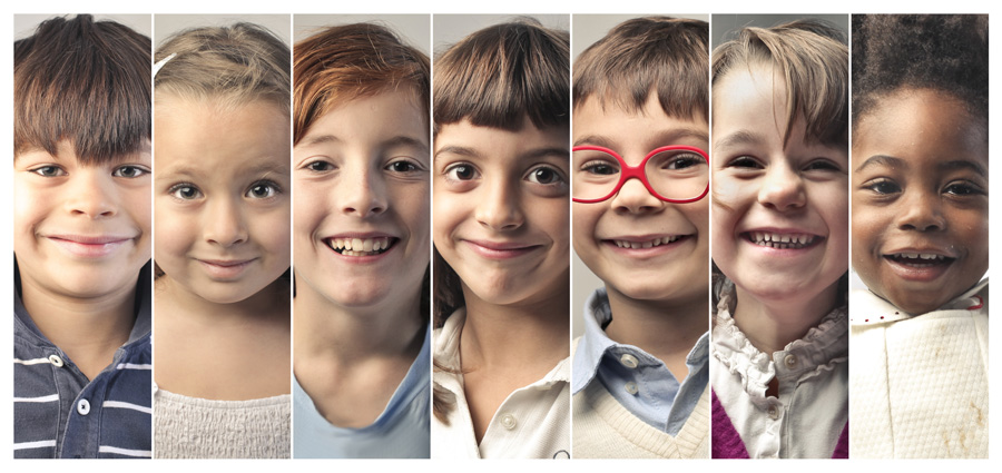 Photo of seven children smiling.